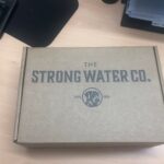 a cardboard bottle box for the strong water company